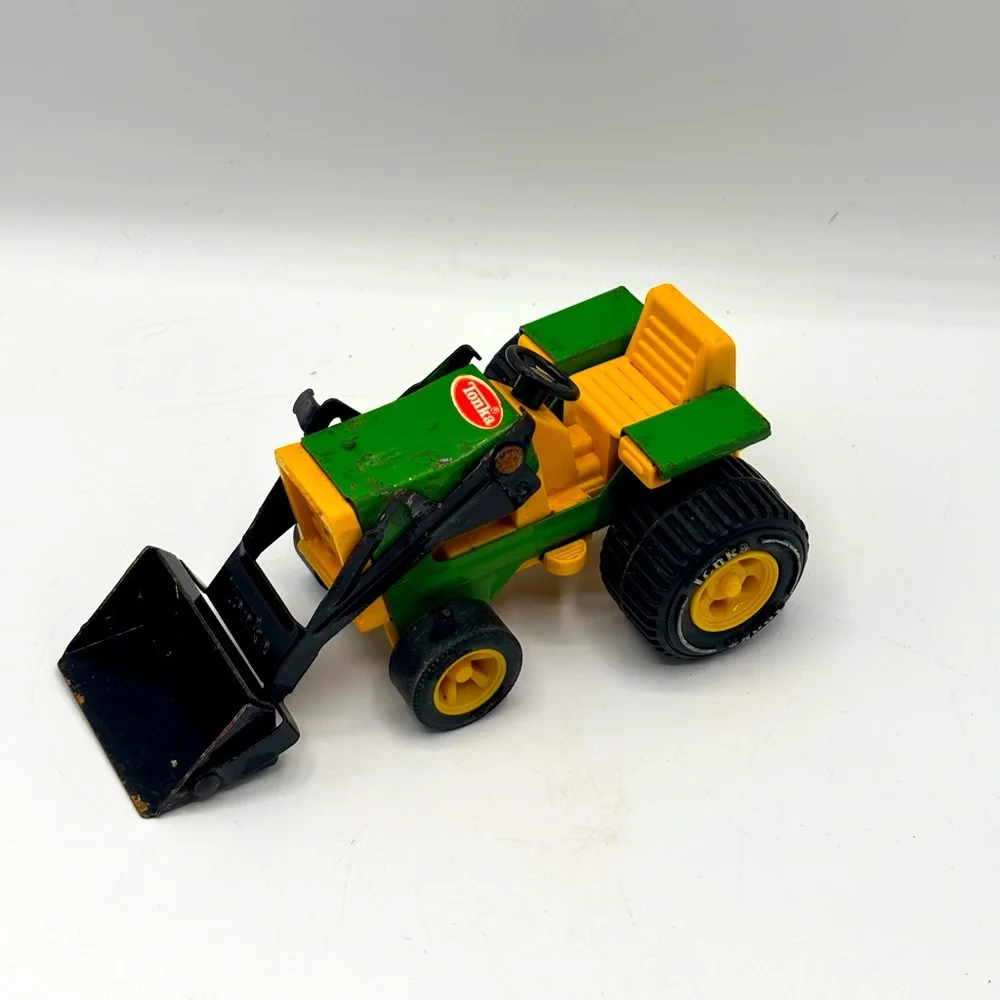 Tonya 1970's steel farm tractor with front end loader.